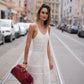 Rote Alberta Ferretti Tasche als Styling-Detail zum MRZ Strickkleid