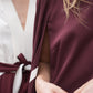 Detail des Alberta Ferretti Kleids mit grafischem Foulard-Print