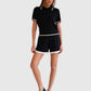 Allude Shorts Navy Cashmere von hinten getragen mit passendem Polo Shirt