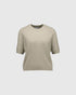Beige short-sleeved cashmere sweater, front view with a ribbed crew neck and hem.