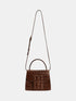 Brown Ramil croc-embossed leather bag, front view with a top handle, shoulder strap and monogram detail.