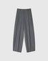 Dark grey barrel-leg pants, front view with pressed creases and belt loops.