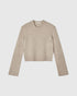 Beige cropped wool sweater, front view with a ribbed crew neck, cuffs and hem.