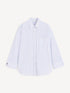 White shirt with fine black stripes and wider stripes at the chest pocket and cuffs, front view.