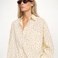Detail der By Malene Birger Derris Voile Bluse Polka Dot Creme im getragenen Styling