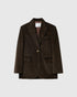 Dark brown oversized corduroy blazer with notch lapels and flap pockets, front view.