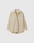House of Dagmar asymmetrische Bluse Creme mit Knopfleiste und gerundetem Saum als Freisteller