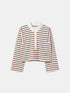 Off-white and mahogany-red striped rugby shirt with a white collar and long sleeves, front view.