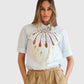 Detail der Dorothee Schumacher Floral Power Bluse Signature Print im getragenen Styling