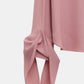 Detail der Dorothee Schumacher Bluse mit Binde-Elementen Rosa als Freisteller