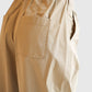 Detail der Dorothee Schumacher Popelin Power Hose Beige im getragenen Styling