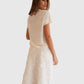 Dorothee Schumacher Rock Spitze Weiß am Model hinten