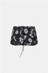 Navy shorts with an off-white floral print, drawstring waist and curved hems, front view.