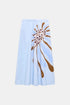 Pale blue flared midi skirt with an oversized brown and white floral print, front view.
