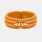 Gas Bijoux Ecume Armband aus orangefarbenem Acetat als Freisteller