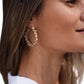 Detail der Gas Bijoux Eurydice Creolen im getragenen Styling