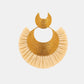 Detail der Gas Bijoux Luna Wave Ohrringe mit Raffia und Gold