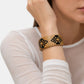 Gas Bijoux Armband aus Raffia in Natur und Schwarz am Handgelenk