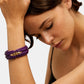 Gas Bijoux Ecume Armband in Violett am Handgelenk