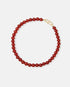 Red carnelian bead necklace with a gold-tone hook clasp.