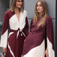 Video mit zwei Alberta Ferretti Kleidern in Braun Weiß und Two-Tone
