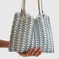 Detail der Rabanne 1969 Flip Bag mit hellblauen 1969 Discs