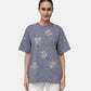 Detail des Rabanne T-Shirts mit Streifen und silberfarbenem Motiv