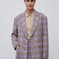 Detail des Rabanne Blazers mit Karomuster und Reverskragen