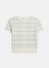 Cream short-sleeved knit top with a fine grey check and ribbed edges, front view.