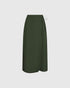 Long forest green wrap skirt with a side tie and overlapping front panel, front view.